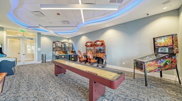 6244 Talon Preserve Dr, Nokomis, FL 34275 - recreation room with carpet floors, a raised ceiling, baseboards, and french doors