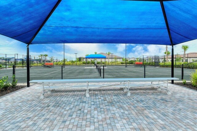 6244 Talon Preserve Dr, Nokomis, FL 34275 - view of property's community featuring fence and a tennis court