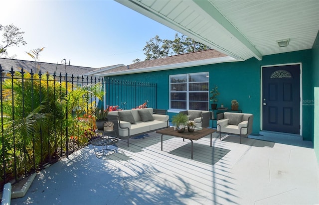2402 16th St W, Palmetto, FL 34221 - view of patio with an outdoor living space and fence