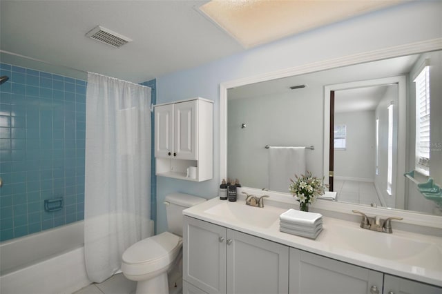 2402 16th St W, Palmetto, FL 34221 - full bath with toilet, shower / bath combo with shower curtain, double vanity, and tile patterned floors