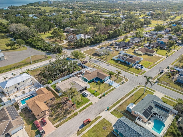 2402 16th St W, Palmetto, FL 34221 - aerial perspective of suburban area featuring a pool area