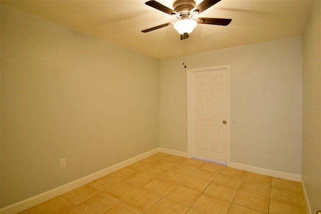 2402 16th St W, Palmetto, FL 34221 - spare room featuring light tile patterned floors and ceiling fan