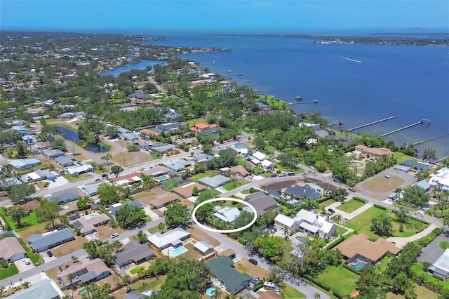 aerial view with a water view and a residential view