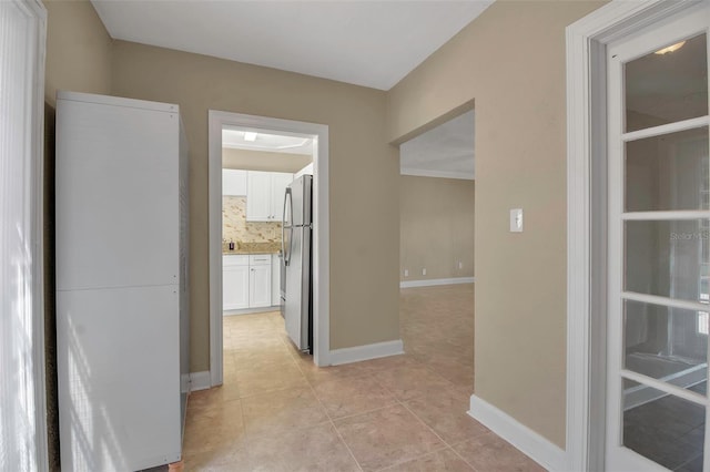 1830 Virginia Dr, Bradenton, FL 34205 - hall with baseboards and light tile patterned floors