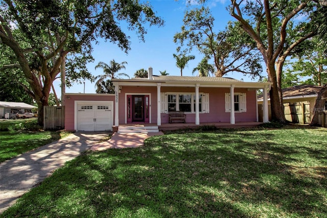 1830 Virginia Dr, Bradenton, FL 34205 - single story home featuring a front yard, driveway, fence, and a garage