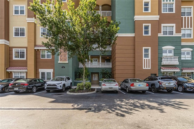 8749 The Esplanade Unit 6, Orlando, FL 32836 - view of building exterior with uncovered parking