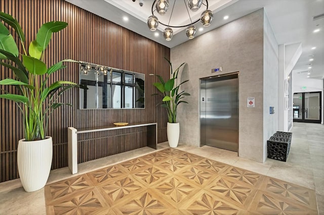 33 S Palm Ave Unit 1403, Sarasota, FL 34236 - reception featuring an inviting chandelier