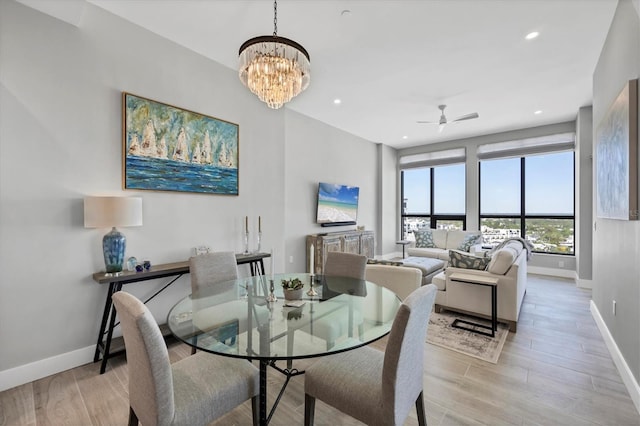 33 S Palm Ave Unit 1403, Sarasota, FL 34236 - dining area with recessed lighting, baseboards, ceiling fan with notable chandelier, and light wood-style floors