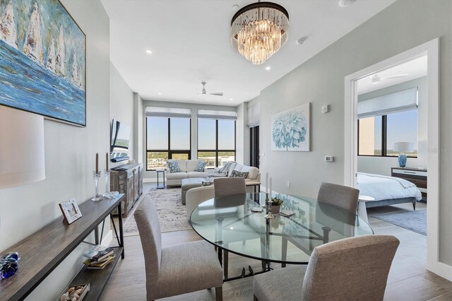 33 S Palm Ave Unit 1403, Sarasota, FL 34236 - dining space featuring ceiling fan with notable chandelier and recessed lighting