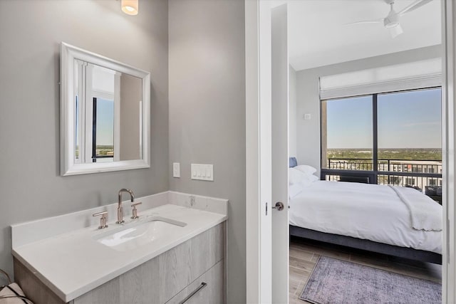 33 S Palm Ave Unit 1403, Sarasota, FL 34236 - bathroom featuring vanity, a ceiling fan, and wood finished floors