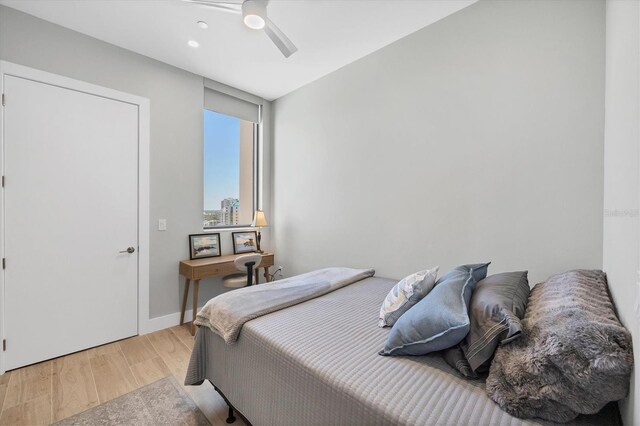 33 S Palm Ave Unit 1403, Sarasota, FL 34236 - bedroom with a ceiling fan, baseboards, recessed lighting, and light wood-type flooring