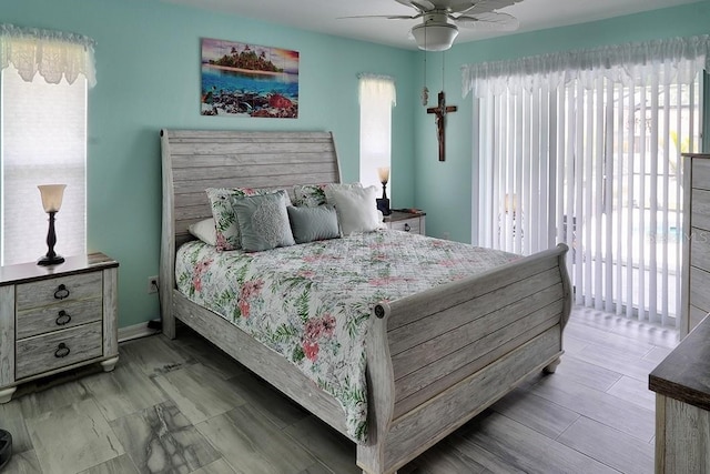 3984 Holin Ln, North Port, FL 34287 - bedroom featuring a ceiling fan and access to outside