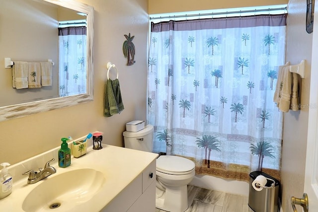 3984 Holin Ln, North Port, FL 34287 - full bath with vanity, shower / bathtub combination with curtain, and toilet