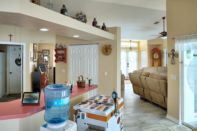 3984 Holin Ln, North Port, FL 34287 - kitchen with ceiling fan, a wealth of natural light, and visible vents