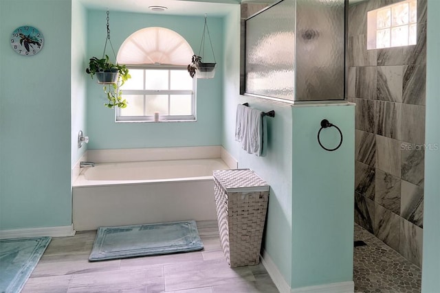 3984 Holin Ln, North Port, FL 34287 - full bath with a walk in shower, a wealth of natural light, and a bath
