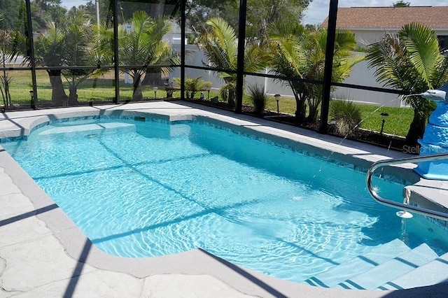 3984 Holin Ln, North Port, FL 34287 - view of swimming pool featuring a patio area, a fenced in pool, and glass enclosure
