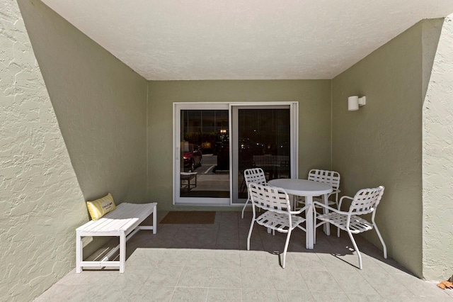 view of patio featuring outdoor dining space