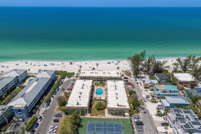 bird's eye view of waterfront with a beach
