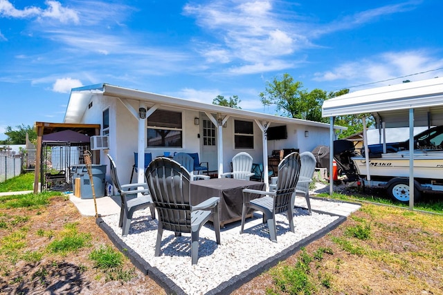 997 28th Avenue Dr E, Bradenton, FL 34208 - back of house with a patio area