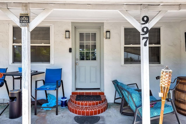 997 28th Avenue Dr E, Bradenton, FL 34208 - doorway to property featuring stucco siding