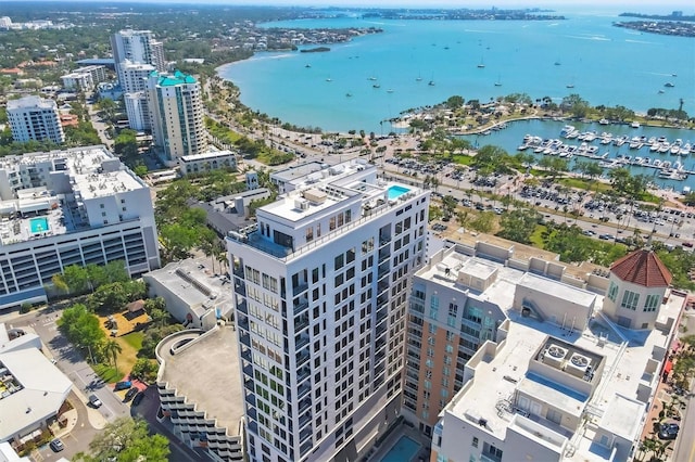 view of urban area featuring a large body of water