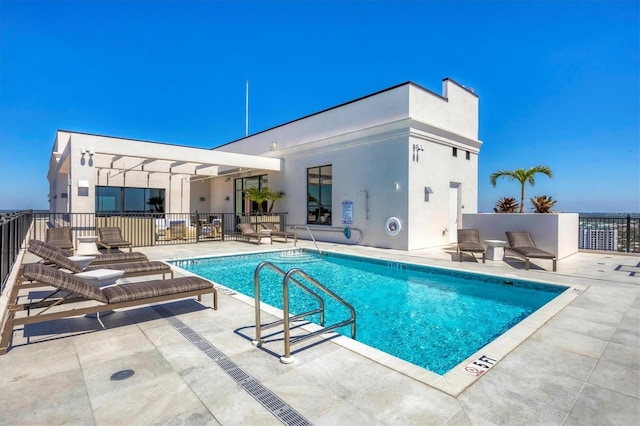 community pool with a patio