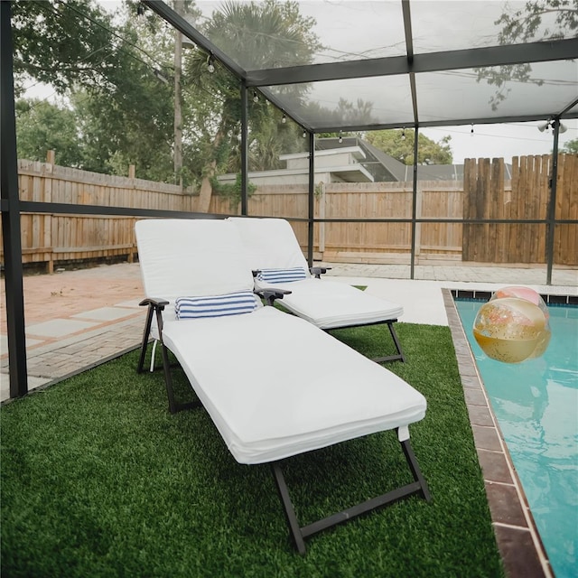 2300 Stratford Dr, Sarasota, FL 34232 - exterior space featuring a fenced backyard and glass enclosure