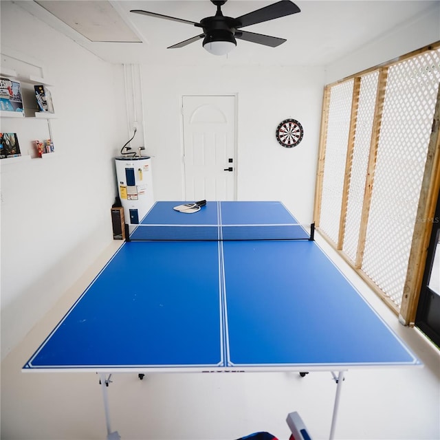 2300 Stratford Dr, Sarasota, FL 34232 - recreation room with electric water heater and ceiling fan