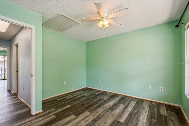 3610 54th St W Unit B4, Bradenton, FL 34209 - spare room featuring wood finished floors, baseboards, ceiling fan, and a textured ceiling