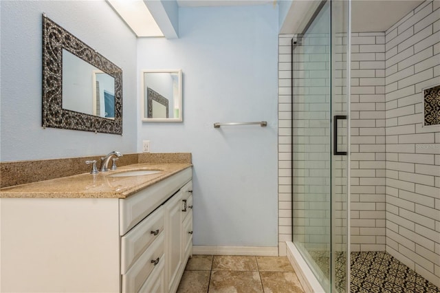 3610 54th St W Unit B4, Bradenton, FL 34209 - bathroom with a stall shower, vanity, and baseboards