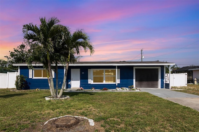 3095 Pinetree St, Port Charlotte, FL 33952 - ranch-style house with concrete driveway and an attached garage