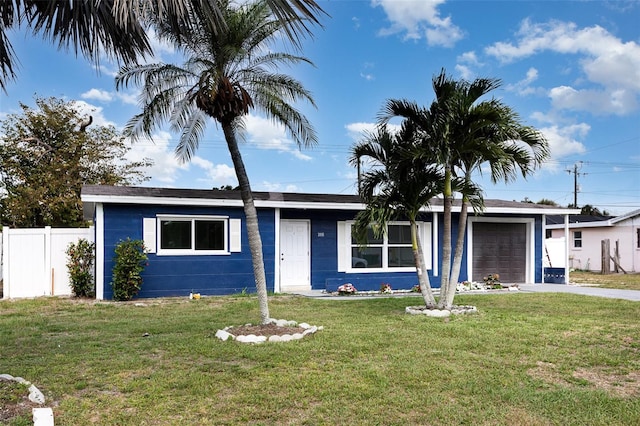 3095 Pinetree St, Port Charlotte, FL 33952 - ranch-style home with a garage and driveway