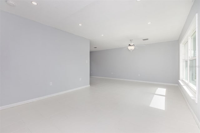 3095 Pinetree St, Port Charlotte, FL 33952 - empty room featuring ceiling fan, recessed lighting, and baseboards