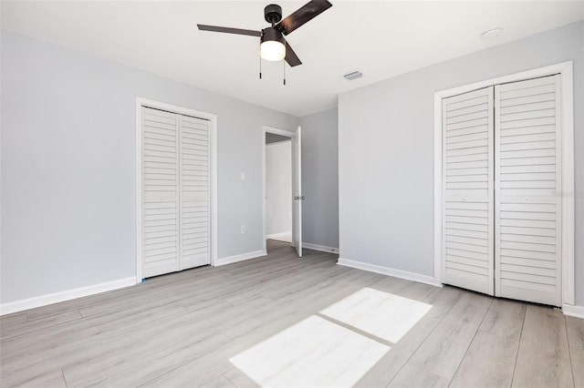 3095 Pinetree St, Port Charlotte, FL 33952 - unfurnished bedroom featuring light wood-style floors, baseboards, and ceiling fan