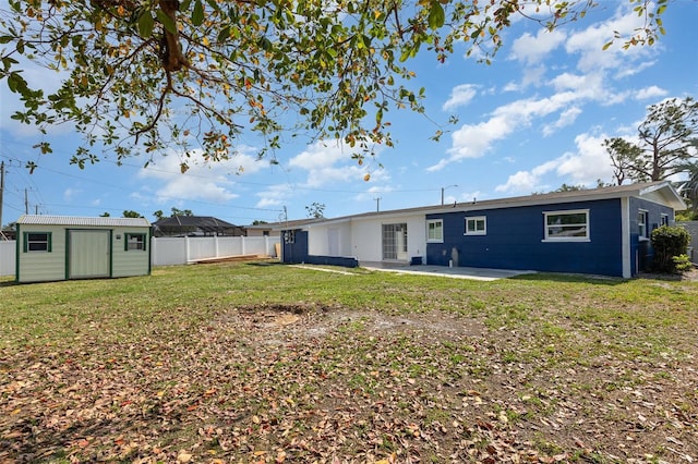 3095 Pinetree St, Port Charlotte, FL 33952 - rear view of house featuring a patio area, an outbuilding, and a shed