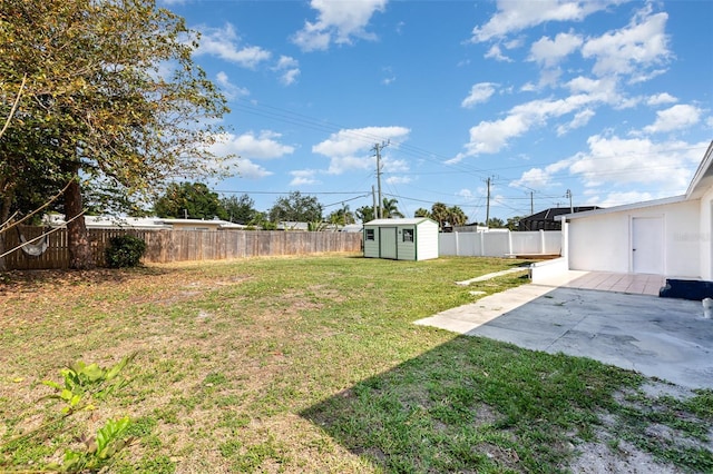 3095 Pinetree St, Port Charlotte, FL 33952 - view of yard featuring a storage unit, a patio, and an outdoor structure