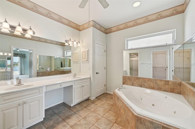 5596 Sabal Trace Dr, North Port, FL 34287 - bathroom featuring a whirlpool tub, double vanity, a ceiling fan, tile patterned flooring, and a closet