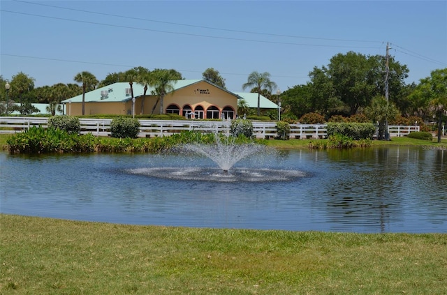 view of water feature featuring fence