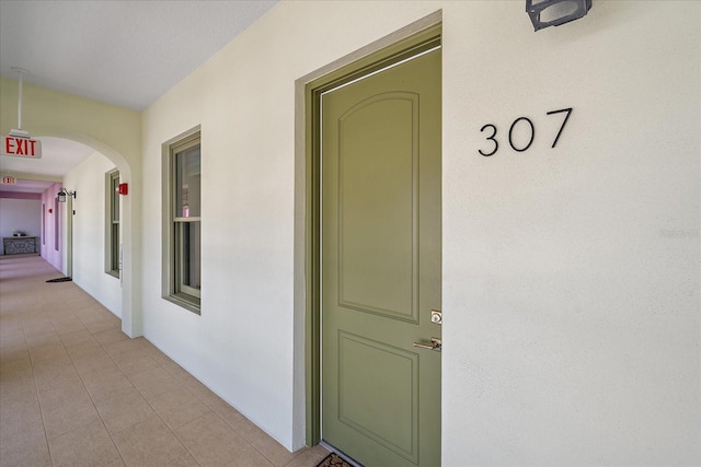 555 N Orange Ave Unit 307, Sarasota, FL 34236 - doorway to property featuring stucco siding