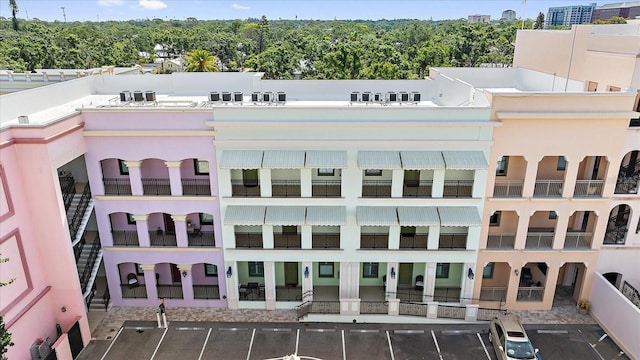 555 N Orange Ave Unit 307, Sarasota, FL 34236 - view of building exterior featuring uncovered parking