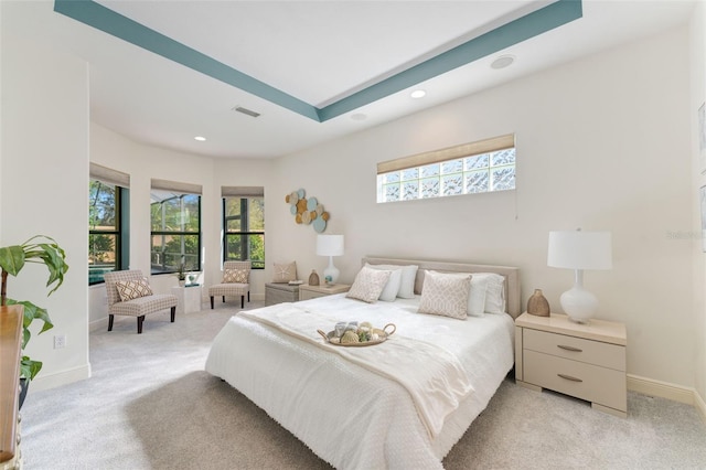 bedroom featuring recessed lighting, baseboards, light colored carpet, and visible vents