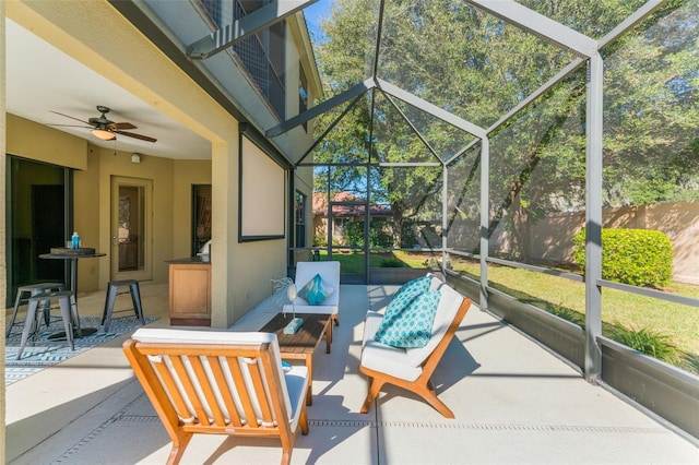 exterior space with an outdoor hangout area and ceiling fan