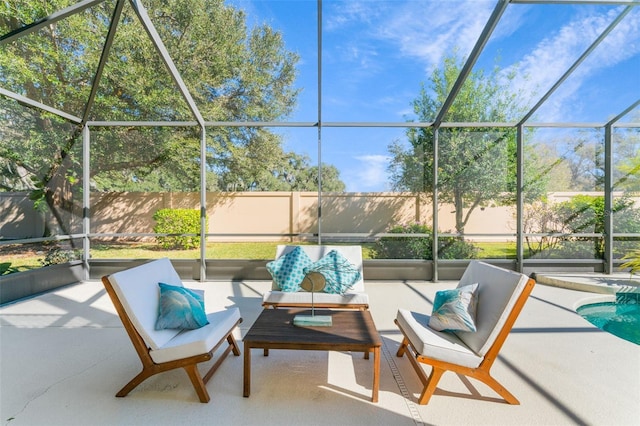 view of patio / terrace with a fenced backyard, a fenced in pool, a lanai, and an outdoor hangout area