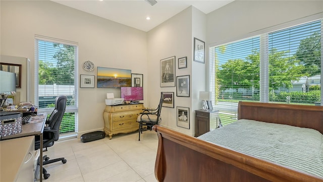 bedroom with light tile patterned flooring