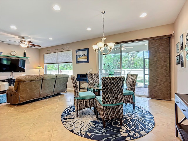 dining room featuring ceiling fan, light tile patterned floors, recessed lighting, and a chandelier