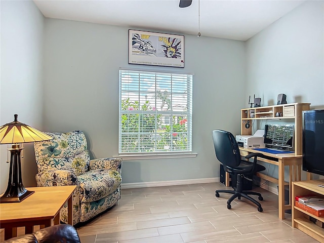 office space featuring baseboards