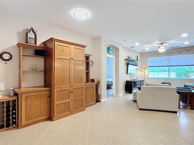 living area with ceiling fan, light tile patterned flooring, recessed lighting, and baseboards