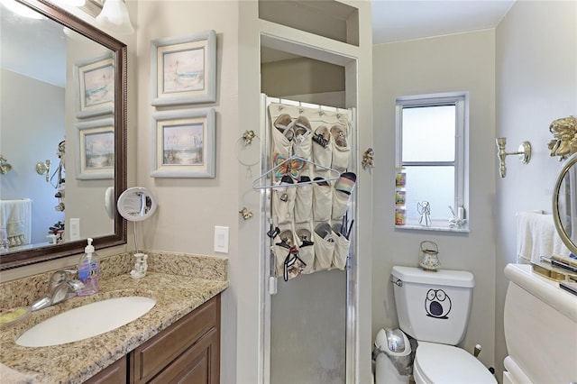 620 Burke Rd, Venice, FL 34293 - full bath with toilet, vanity, and curtained shower