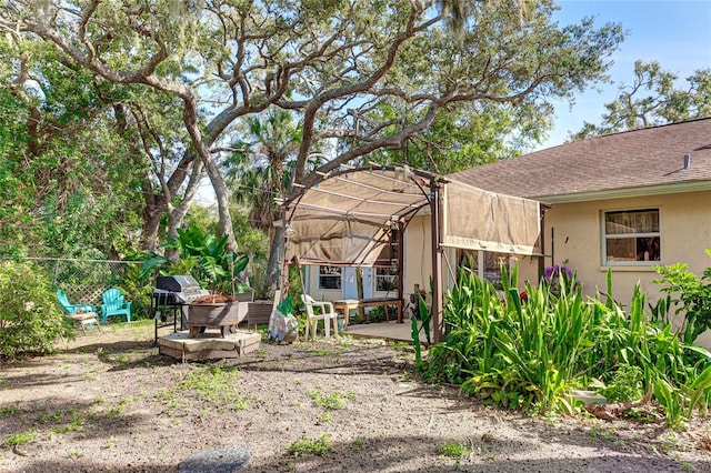 620 Burke Rd, Venice, FL 34293 - view of yard featuring a patio and fence