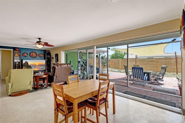 dining room with a ceiling fan